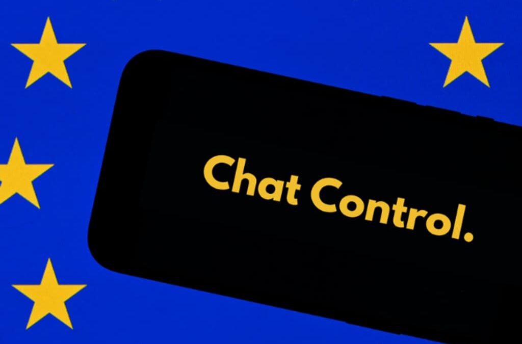 Black smartphone displaying the text "Chat Control" in yellow, set against a blue background with yellow stars evoking the European flag